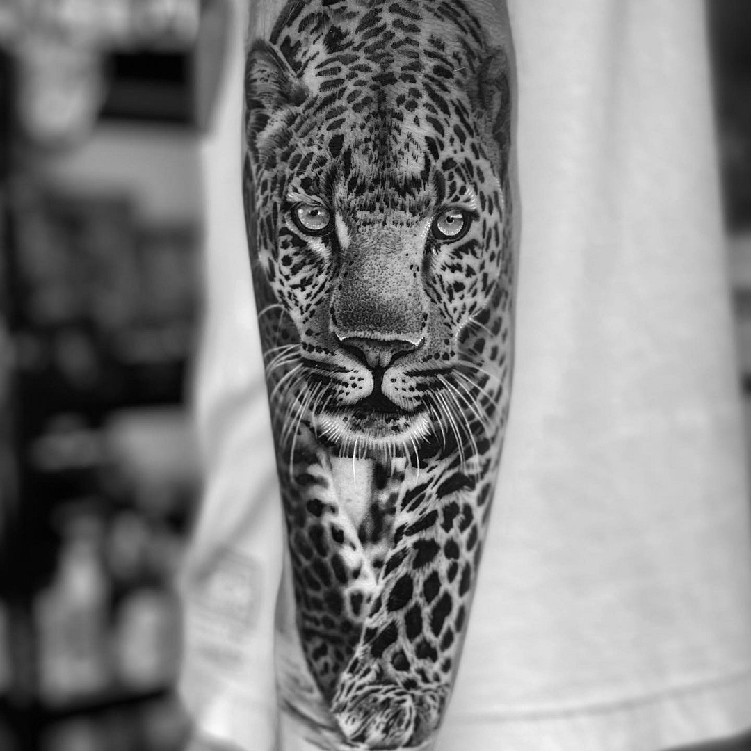 Realism (black & grey) tattoo by Dave Freeman