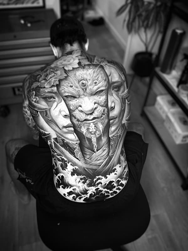 Realism (black & grey) tattoo by Dave Freeman