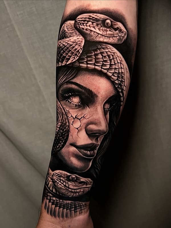 Realism (black & grey) tattoo by Mia Hansen