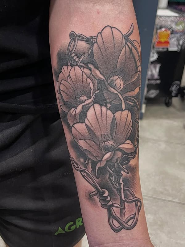 Illustrative tattoo by Aron Fitz