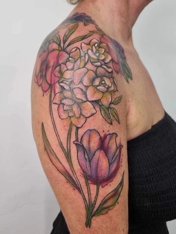 Watercolour tattoo by Reed