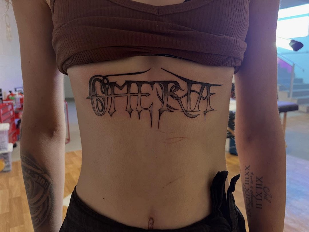 Illustrative tattoo by Sam Shears