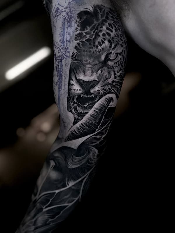 Tattoo by H E L L R A Z O R