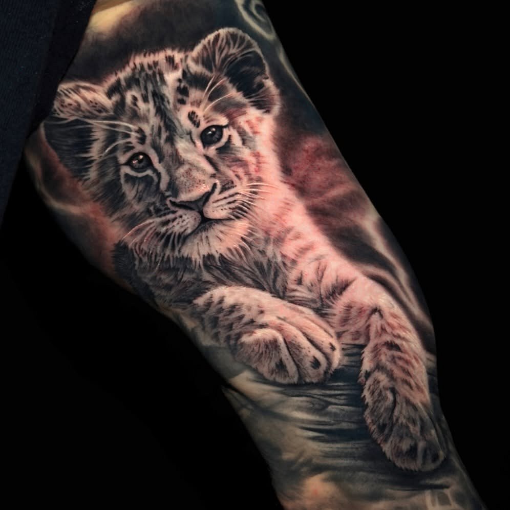Realism (black & grey) tattoo by Arian
