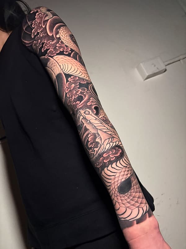 Tattoo by Taira Uchida