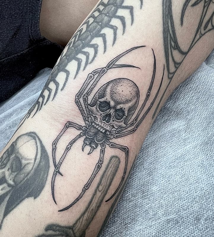 Illustrative tattoo by JESSE PETRIE