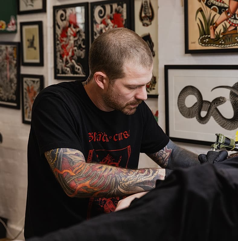 Illustrative tattoo by JESSE PETRIE