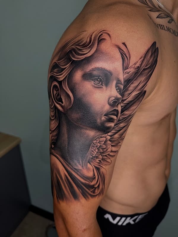 Realism (black & grey) tattoo by Brody Schafer