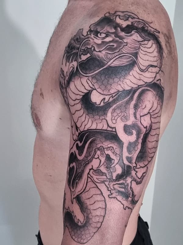 Illustrative tattoo by Shawn Ruste