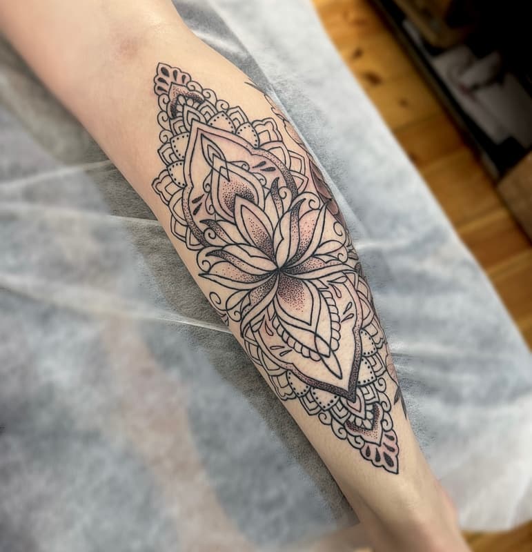 Geometric tattoo by Lucille Brawl Tattoos