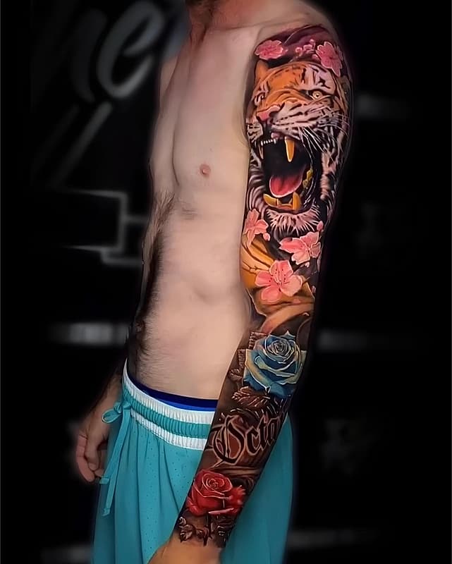 Realism (colour) tattoo by  Boris Tattoo