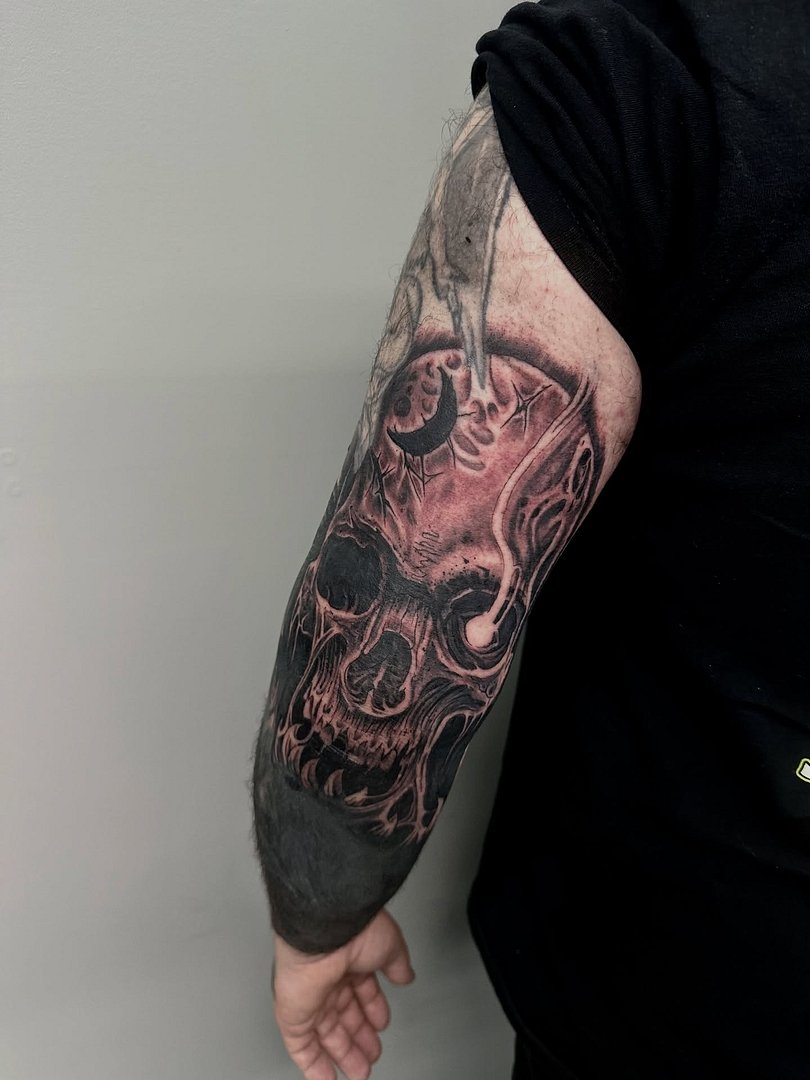 Realism (black & grey) tattoo by Danny