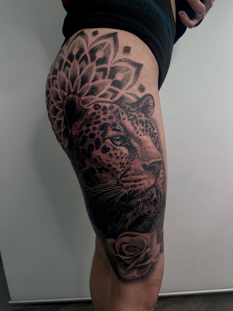 Realism (black & grey) tattoo by Danny