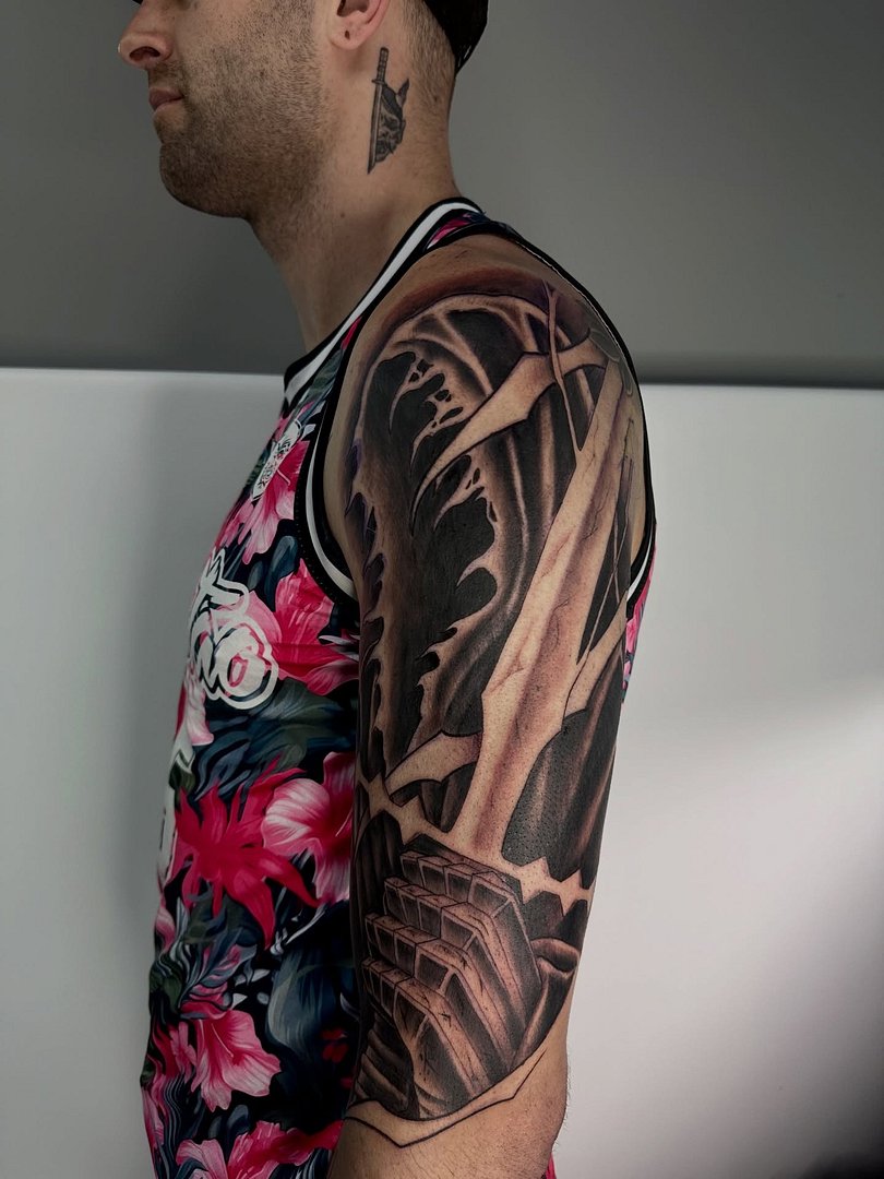 Realism (black & grey) tattoo by Danny