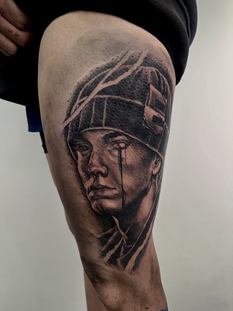 Realism (black & grey) tattoo by Danny