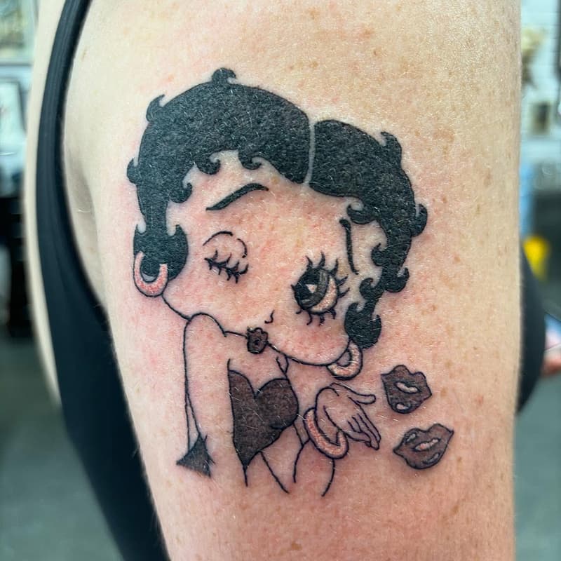 Illustrative tattoo by Yasmin T. Tattoos