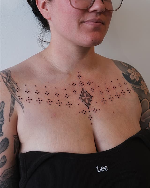 Illustrative tattoo by Milly Weber